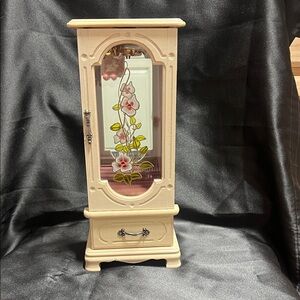Elegant Cream Jewelry Cabinet with Floral Design